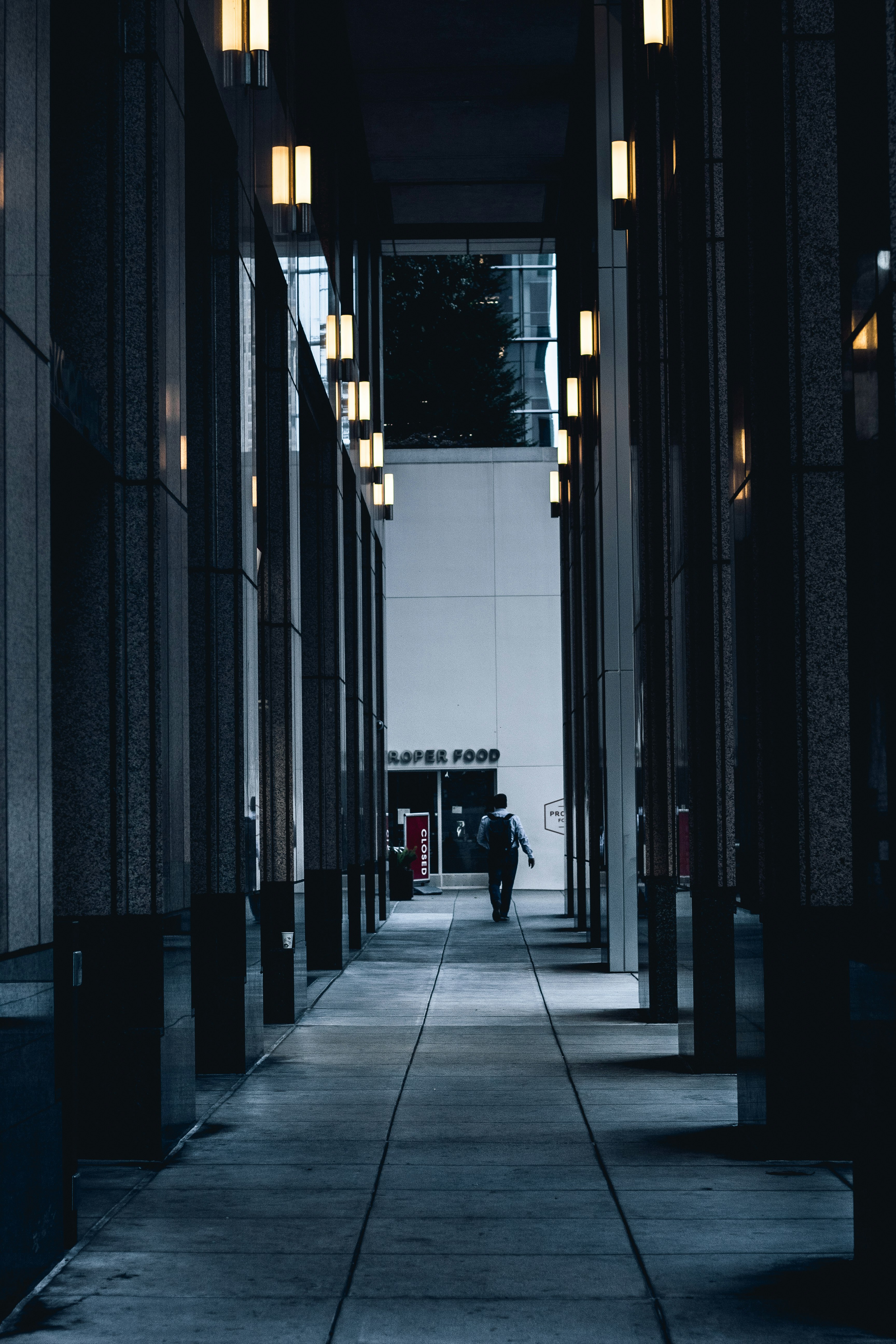 man walking on tunnel